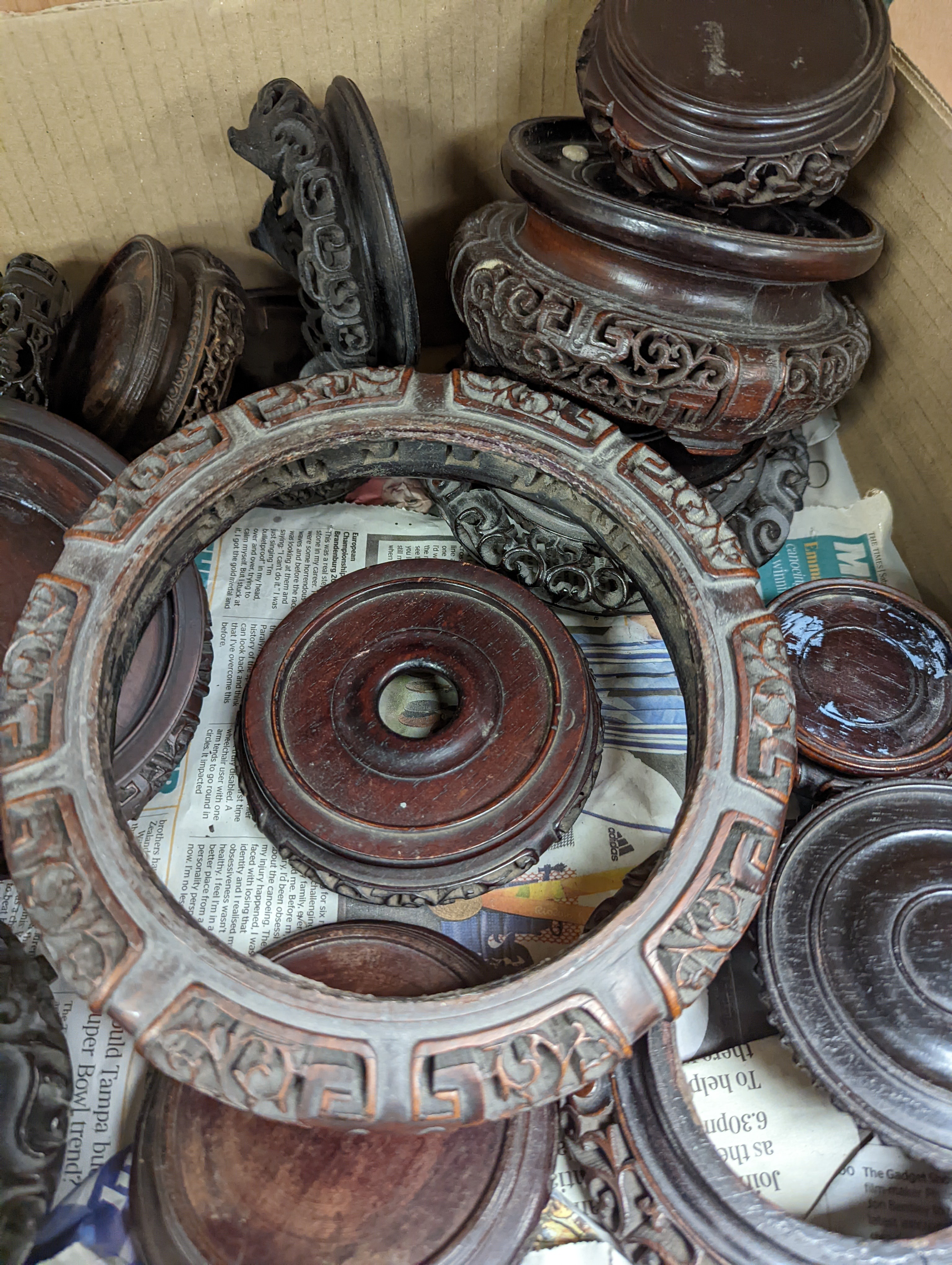 A collection of Chinese hardwood stands, largest 23. 5 cm